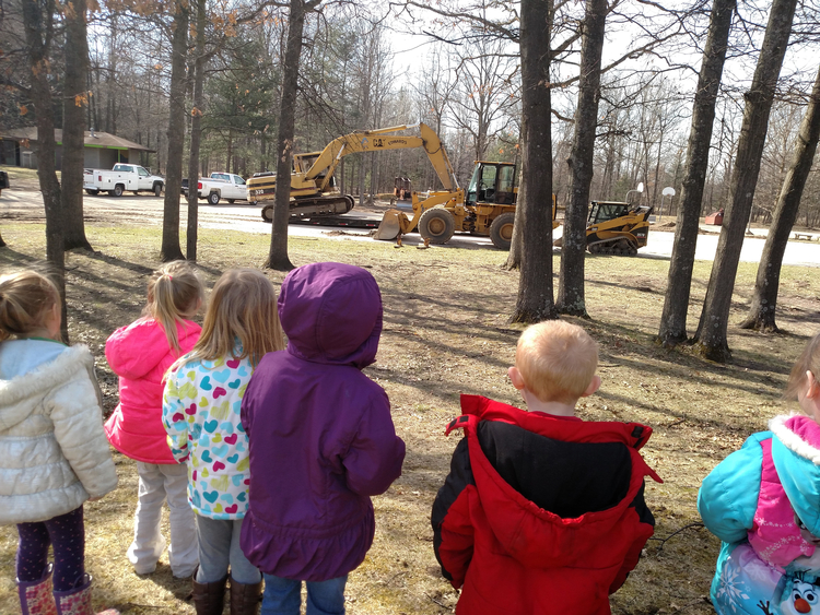 Children watch as West Midland Family Center completes renovation work earlier this year
