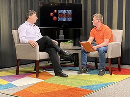 Kevin Heye, executive director of Safe and Sound Child Advocacy Center, with Luke Drumright of "3-2-1 Connection"