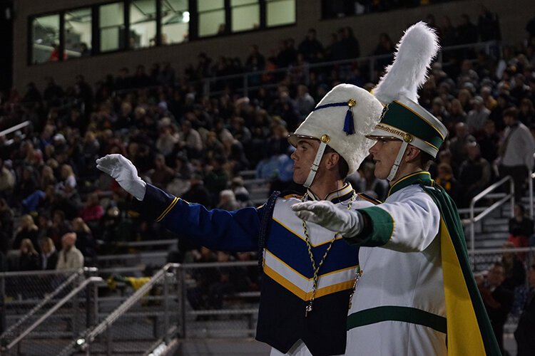 Despite being rivals, H.H. Dow and Midland High's bands have a lot of fun together. (Crystal Gwizdala)