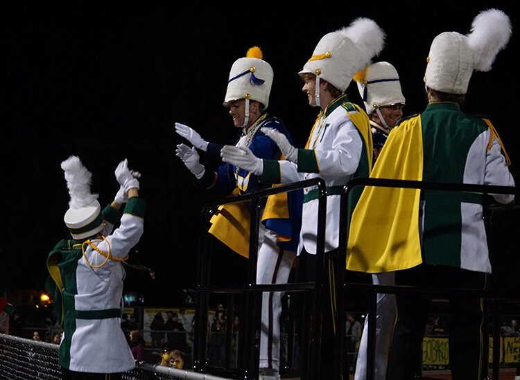 Despite being rivals, H.H. Dow and Midland High's bands have a lot of fun together. (Crystal Gwizdala)
