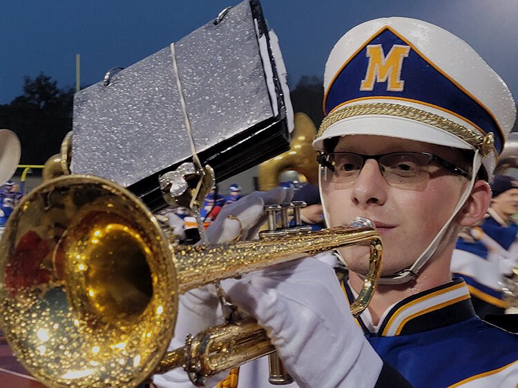 Midland High's band performs in the rain on Oct. 15. (Ron Beacom)