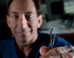 DR. TIM FISCHELL HOLDS THE HIS INVENTION THE OSTIO PRO / Erik Holladay