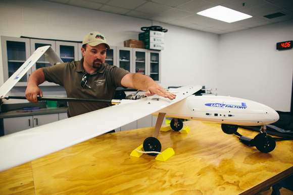 Carl Rocheleau, UAS instructor puts together the Penguin UAV Factory B Model.