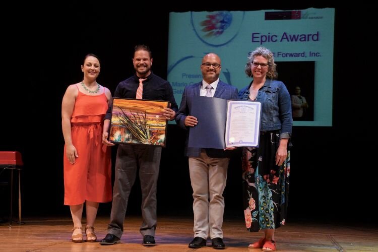Receiving the Epic Award from the Arts Council of Greater Kalamazoo.