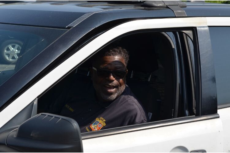 Pastor Greg Jennings was the first to volunteer to get into the drivers seat of the patrol car.