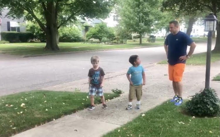 Don Solesbee prepares to race his son Luca, left, and neighbor Rowin Hernandez a couple of years ago on a sidewalk adjacent to their homes on Reycraft Street.