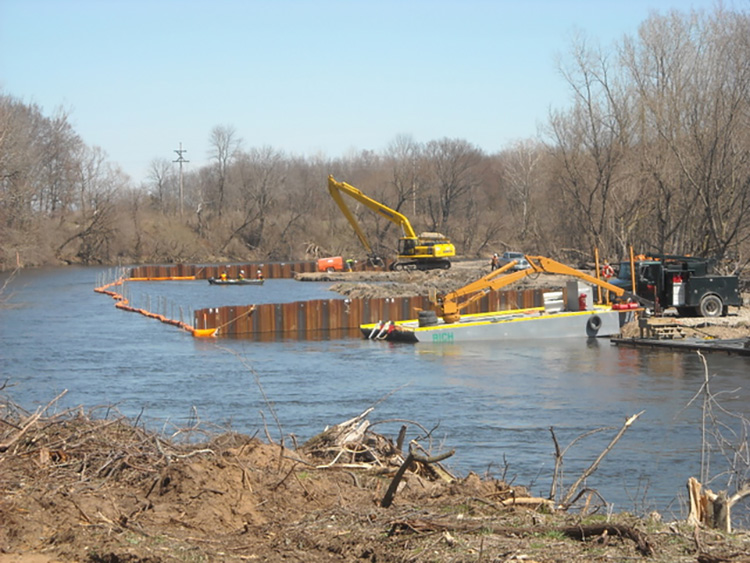 Dredging to remove contaminated sediments along the Kalamazoo River.