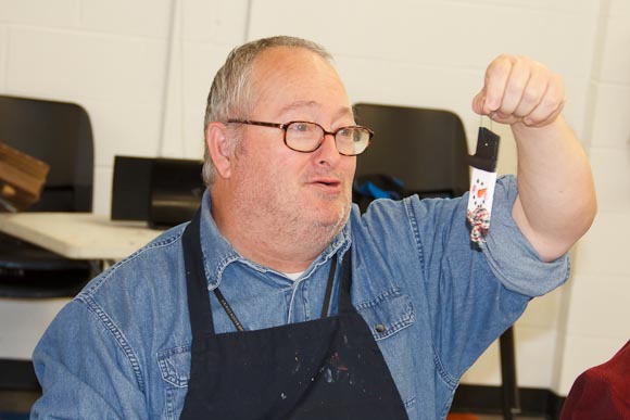 Ronald Thayer shows off finished ornament