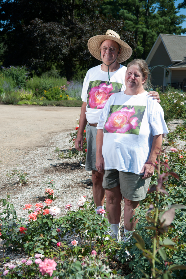Tom , left, and Joyce Conklin enjoy growing roses and many other flowering plants at Walnut Hill Farm near Bangor. 