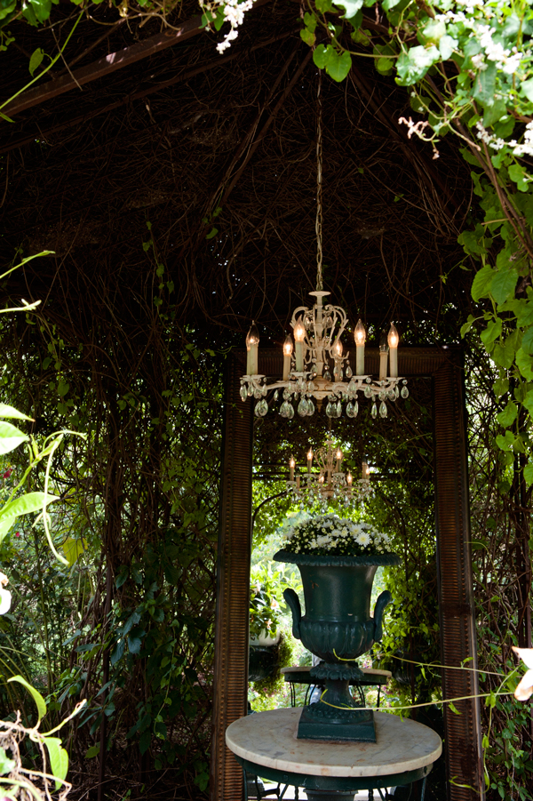 A Gazebo covered in greenery and flowers is used as the focal point for many wedding ceremonies. 