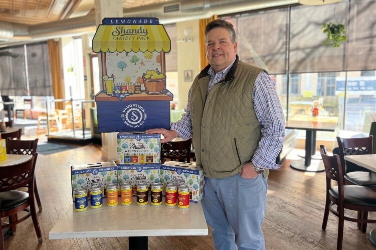 Saugatuck Brewing Company CEO John Miller with the new Shandy Variety Pack. 
