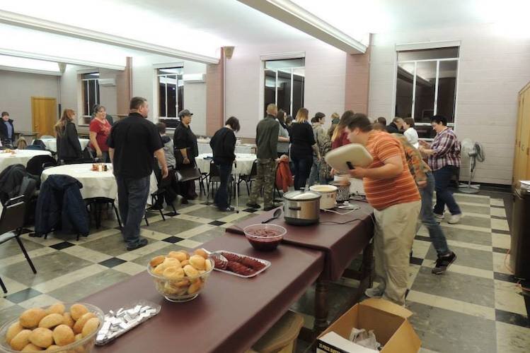 Scenes from past Battle Creek Pride Thanksgiving dinners.