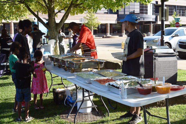 Attendees at a Sept. 25 outdoor celebration of Hispanic Heritage Month at Friendship Park were able to sample foods such as tacos served up at this taco bar.