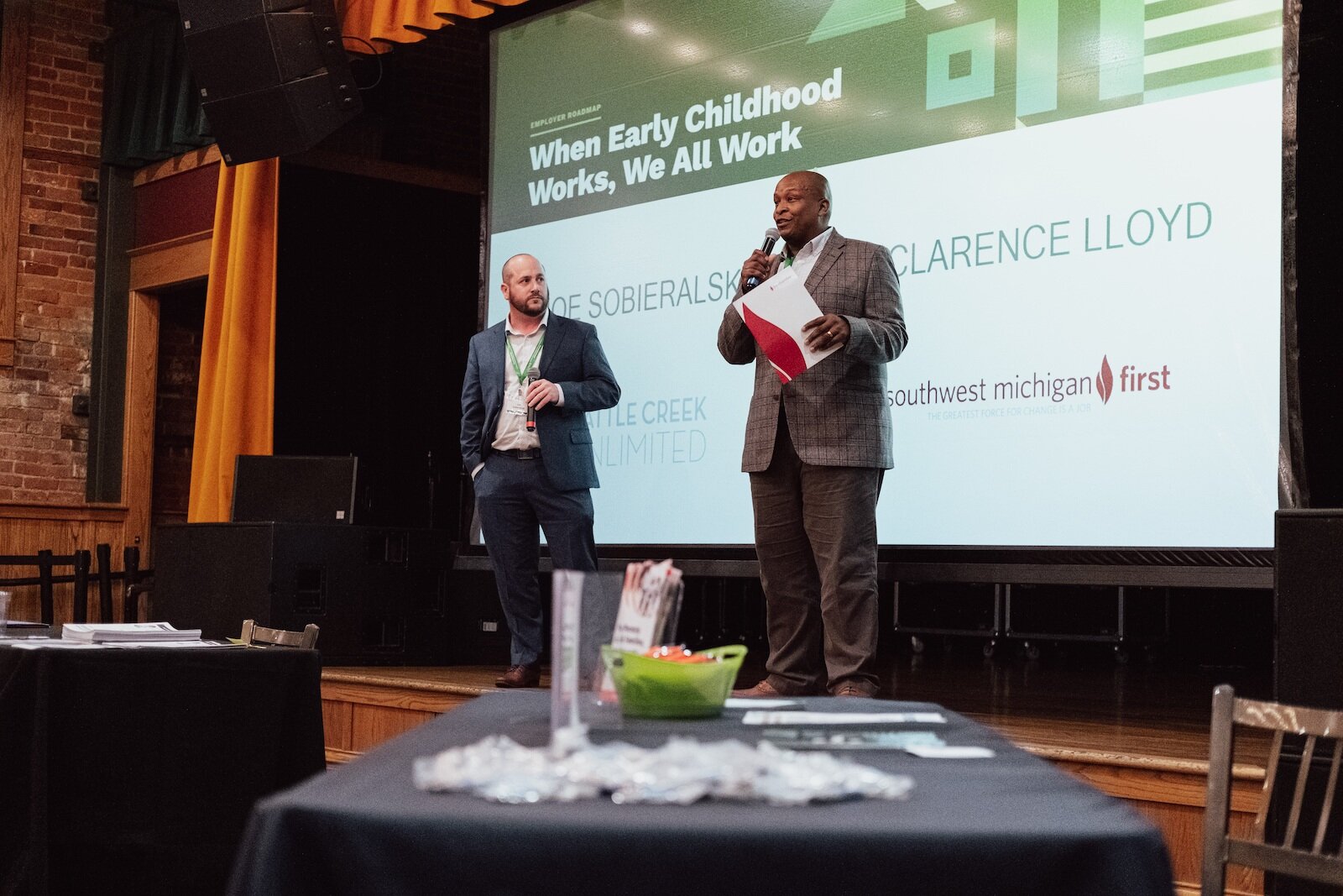Joe Sobieralski and Clarence Lloyd speak at a recent summit for business leaders seeking options for their employees who need childcare.