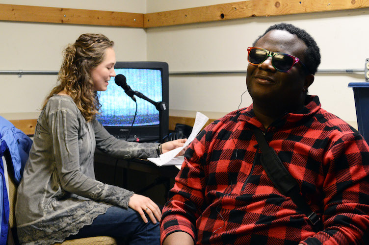 Abby Tongue, grad student at WMU’s Department of Blindness and Low Vision Studies, and fiancé Osman Karoma, testing audio description service for Kalamazoo Civic Theatre.