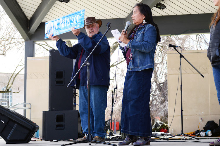 Historian and co-chair of the Kalamazoo Reservation Public Education Committee, and Phyllis Davis, Gun Lake tribal council member, reveal the 1821-1827 Pottawatomi Reservation Line at Bronson Park’s Earth Day celebration, April 20.