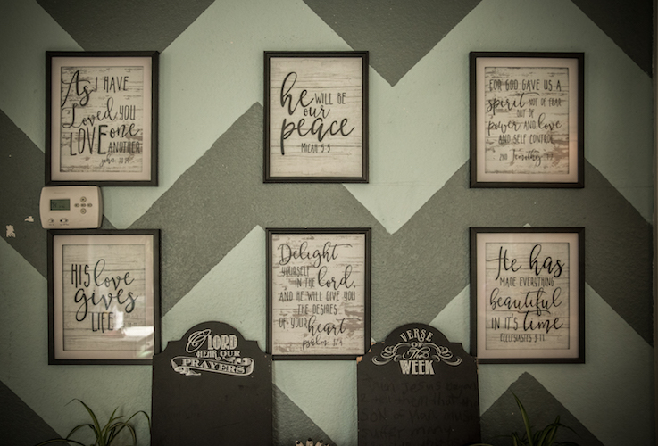 A wall inside the Jaurezes' home shows what's important to them. Photo by Fran Dwight.