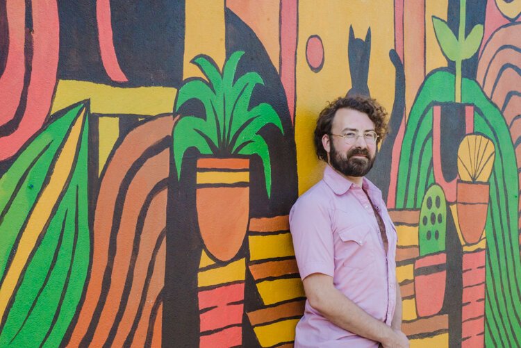 Trevor Grabill, printmaker and illustrator, recently completed his first ever mural in his Vine neighborhood.