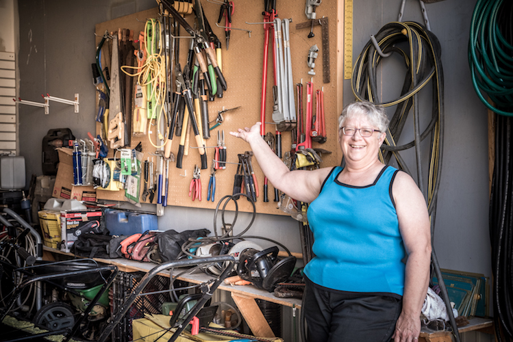 Assistant Director Gail Shannon shows off the tools in the Tool Share program.
