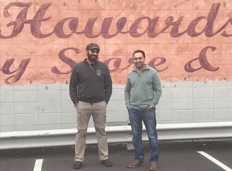 Gary Singh and Vik Bawa in front of Howard's Party Store where they work together.  They went to Lansing with the ENA to fight changes to state rules regarding alcohol sales.