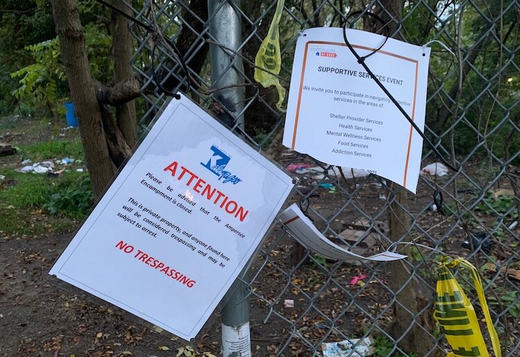 Those living without houses were informed they could no longer stay at the Ampersee Encampment and a no tresspassing notice was posted.