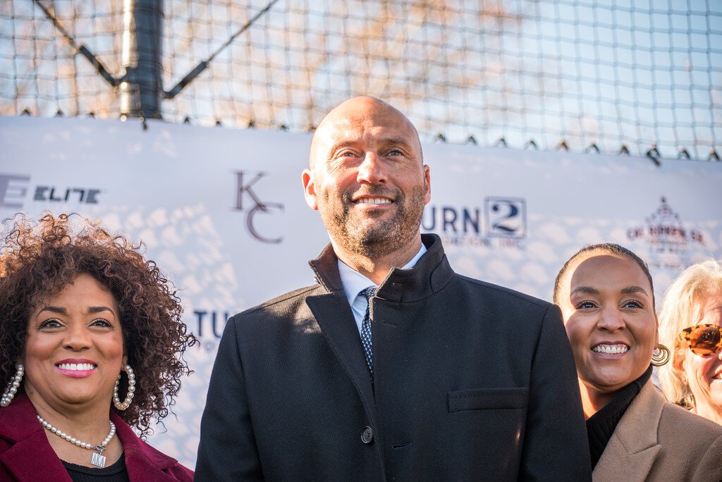 Kalamazoo Central Principal Valerie Boggan, left, stands with baseball great Derek Jeter and his sister Sharlee during the Nov. 14, 2023 dedication of baseball/softball fields at the school.