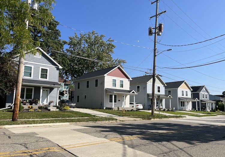 A row of two-story houses by the Kalamazoo Attainable Homes Partnership on Burr Oak St. in Vine.