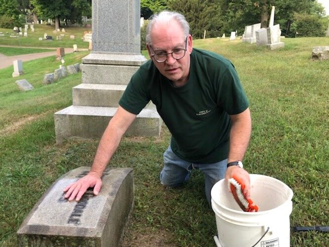 Volunteer Mark Dunham says he enjoys his work with the Grave Issues Squad.