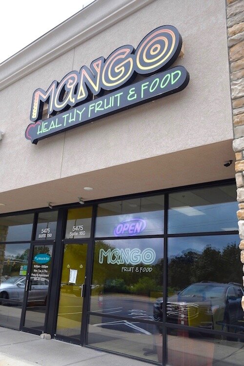 Store front of Mango Healthy Fruit and Food at the intersection of Beckley and Riverside.