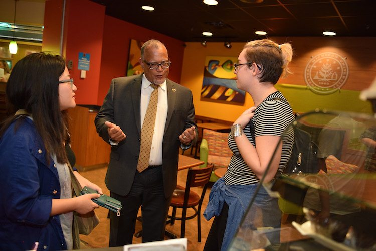 Dr. Edward Montgomery meets with students at he begins work at WMU. Photo by Mike Lanka