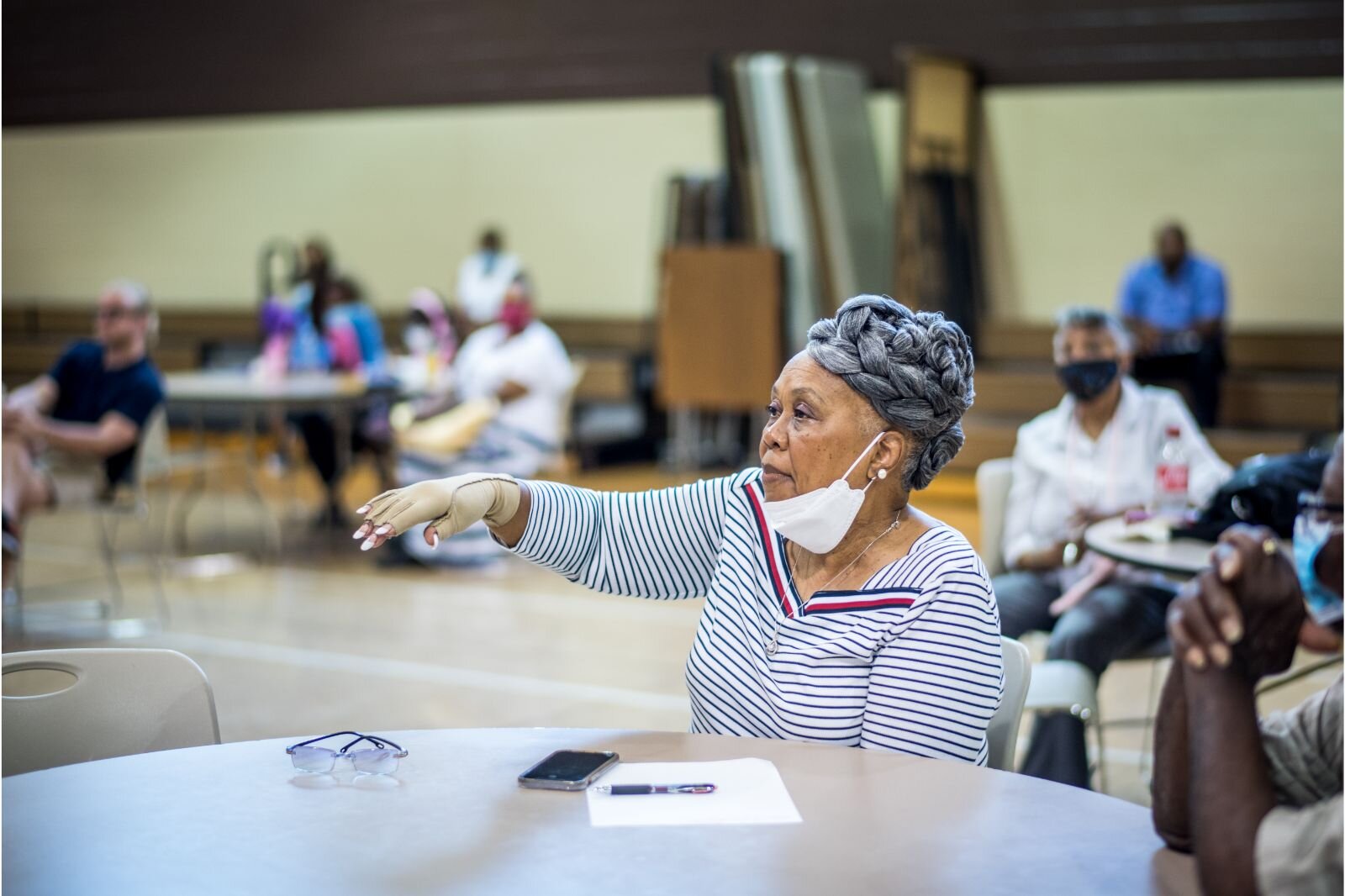 Seniors ask questions about plans for an affordable senior housing complex during a Thursday, July 21, 2022 charette, an idea-sharing community workshop.
