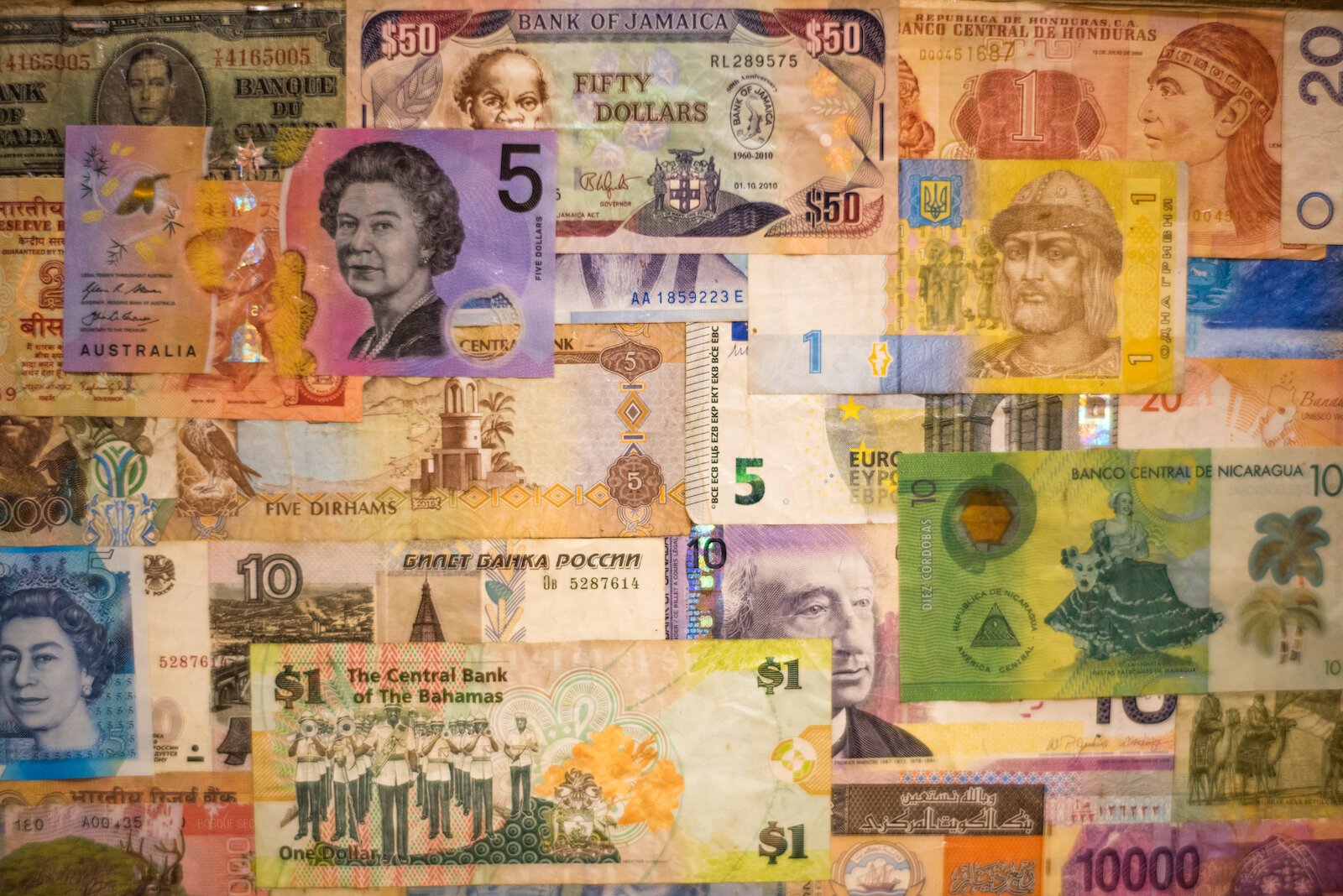 A collage of money from around the world is one of Caffé Casa's longstanding displays.