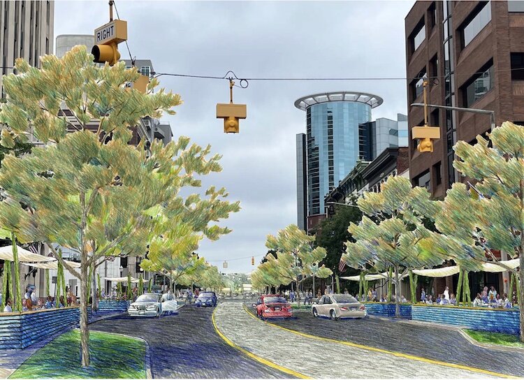   Trees, outdoor dining, calmed traffic on a two-way Michigan Avenue. A possible scene from Downtown Kalamazoo, ten years from now? From the Notre Dame charrette study, Downtown Kalamazoo, A Study of Urban Sequences and Activation of the Public Realm