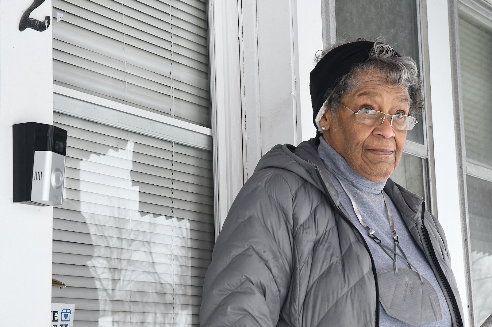 Shirley McKinney, who has a smart doorbell, stands in front of her home on Bowen Street.