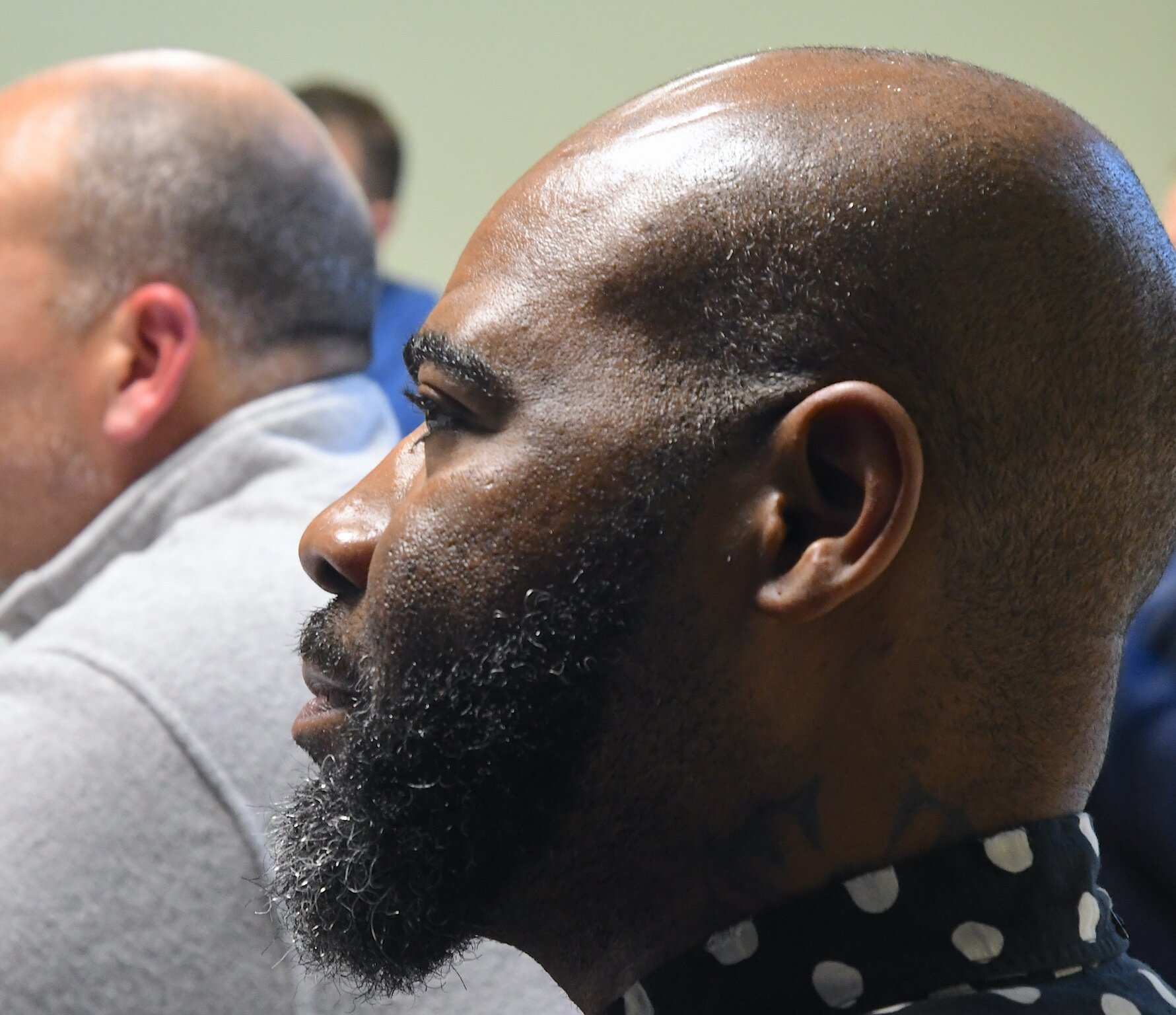 Sean Stallworth, an Air Force veteran from Battle Creek, listens to presenters during the opening session of the Michigan Veteran Entrepreneur Lab session in Battle Creek.