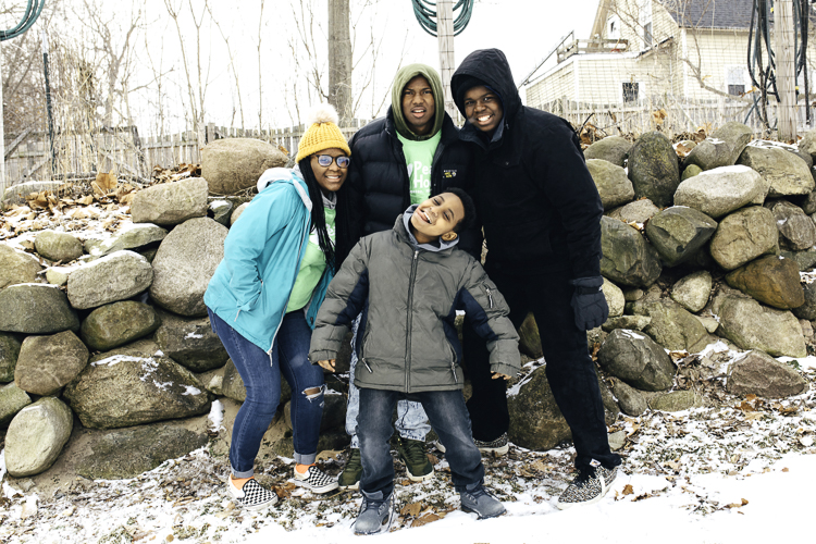  Members of the Youth Advisory Team and Peace House youth enjoy the outdoors during all seasons.