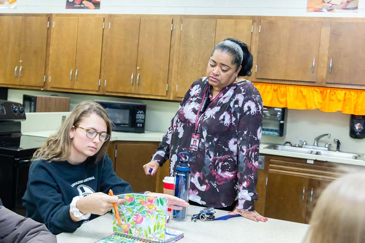 Lisa Boulding works with young people in a leadership program at Kalamazoo Central High School