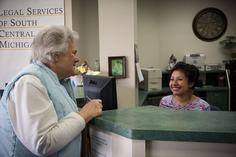 Client Phyllis Robinson, left, and Gabriela Vicente-Lemus of Legal Services of South Central Michigan. Photo by Susan Andress
