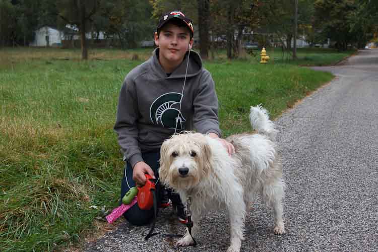 Damian Diamante started a dog walking service after taking a Generation E course. Photo by Susan Andress