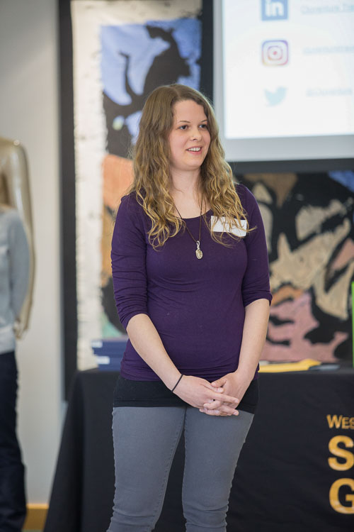 Desi Taylor talks about her business, Cluventure Travel, at Demo Day this March at Western Michigan University. Photo courtesy of  www.caseyspring.net