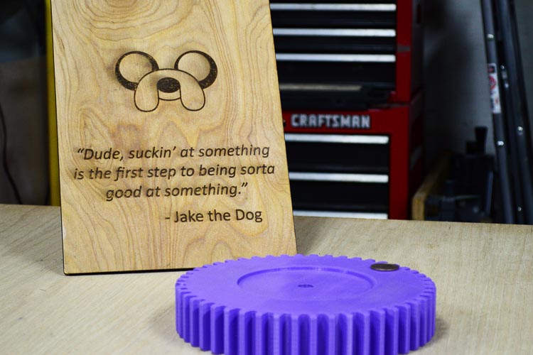 Inspirational quote from Jake the Dog of ”Adventure Time” and 3D printed industrial gear.
