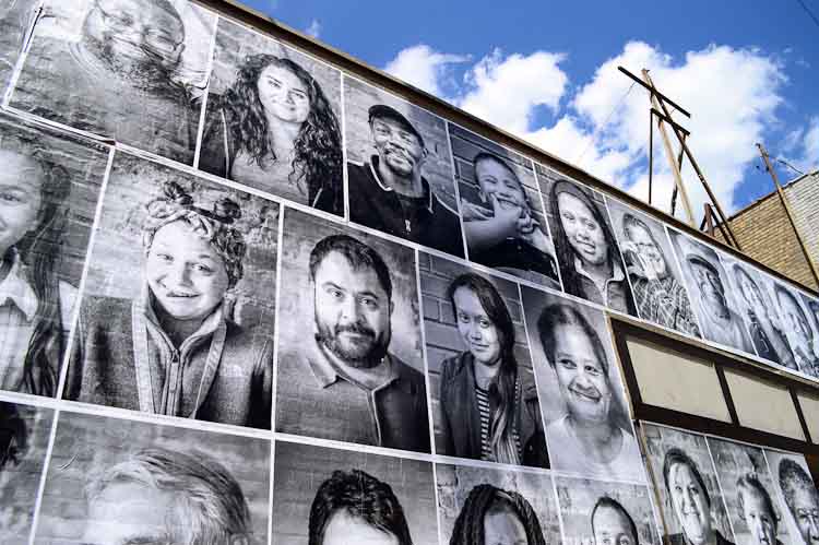 The portraits are meant to showcase the diversity of people and places in Edison, and to beautify spaces that have been or are currently vacant. Photo by Mark Wedel