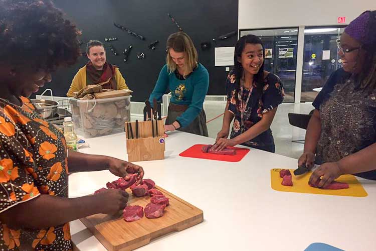 The Refugee Outreach Collective at work in the First Baptist Kitchen