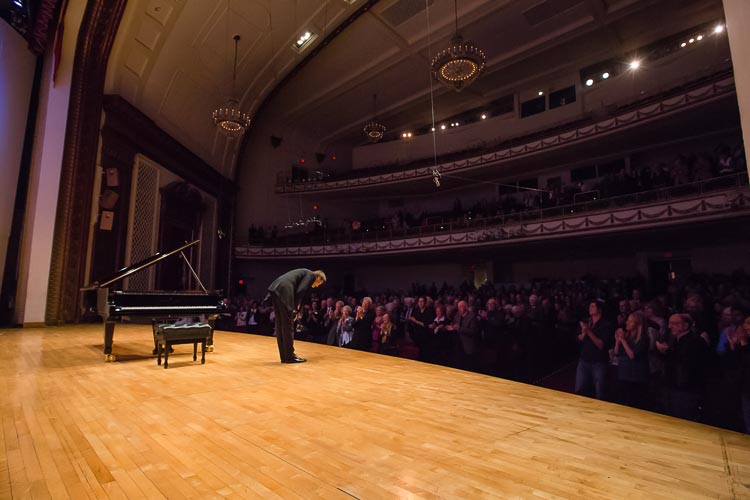 Daniil Trifonov takes a bow at Chenery Auditorium during the 2014 Gilmore Keyboard Festival. Photo by Chris McGuire Photography