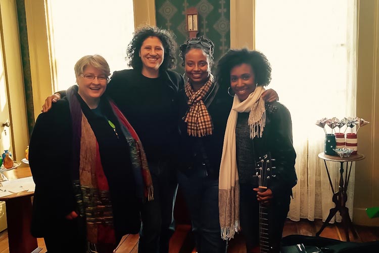 Patti Parker, hostess; Michelle Johnson, tour coordinator; Denise Miller, poet; and Nashon Holloway, musician at the Governor's Mansion in Marshall on the 2016 tour.