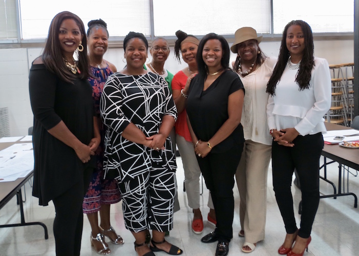 Tendaji Co-Founder Sabrina Pritchett-Evans, far left, and some 20 members of her new philanthropic group take a break during the Saturday, Aug. 18 inaugural round of grant applicants' pitches. Photo by Earlene McMichael/WMUK 