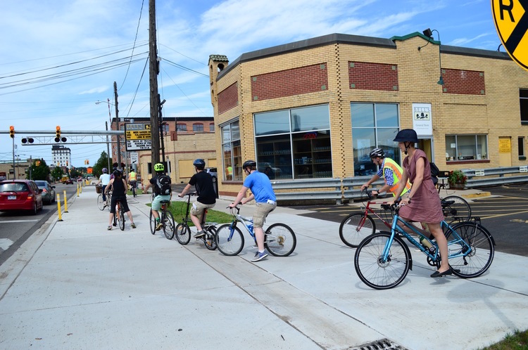 Training Wheels riders test new protected bike lane on Kalamazoo Avenue.