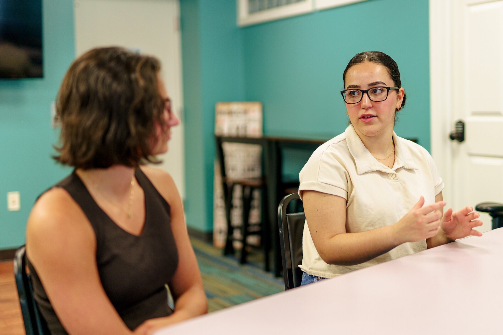 Haila Jiddou (right), and Danielle DeVine (left) are spending their summer helping to create a youth-driven program that offers community experiences to local teens.