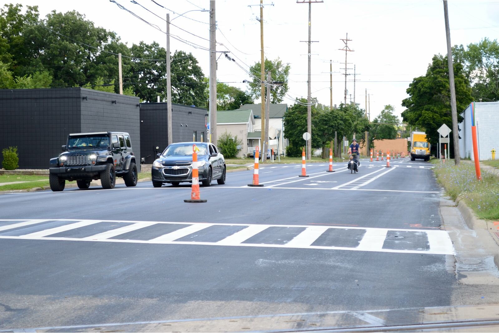  North Westnedge traffic calming: Two right-sized traffic lanes, a bike lane and curbside parking, meant to help slow traffic to the speed limit and give alternate forms of transportation a space. Cones are where permanent posts will be placed.