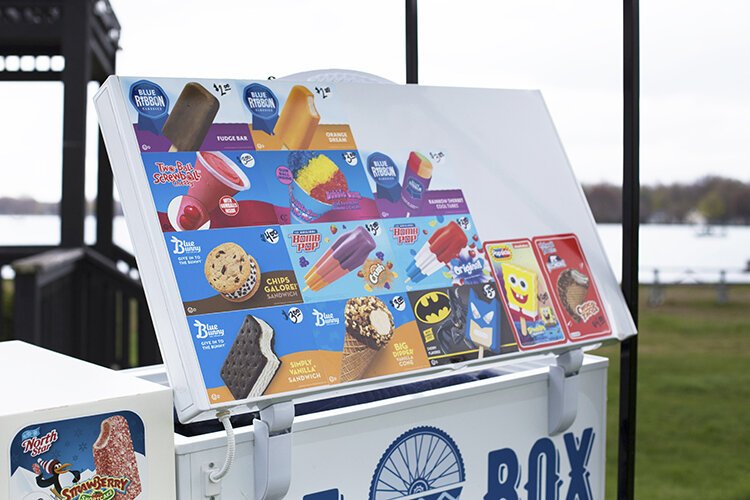 Ice Box Novelties offers iconic ice cream treats such as Bomb Pops, Orange Dream Bars, Screwballs, Snowcones, and Choco Tacos.